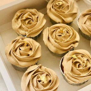 Rose cupcakes with gold paper