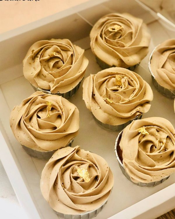 Rose cupcakes with gold paper